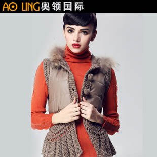 2012 autumn and winter fashion women's fashion . sheep wool knitted with a hood sleeveless outerwear top wadded jacket