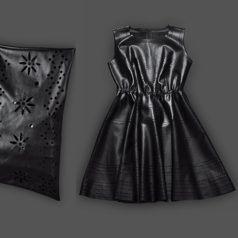 2012 fashion autumn brief vintage paper cutting cutout soft PU skirt black leather skirt leather bags