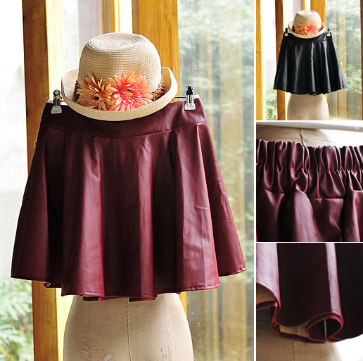 2012 fashion elegant elastic waist PU faux leather expansion skirt fluffy short skirt leather skirt bust skirt