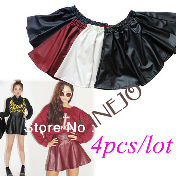 4PCS/LOT Free shipping New Korean Women's Winter PU leather Ruffles Skirt Short-skirt 9235