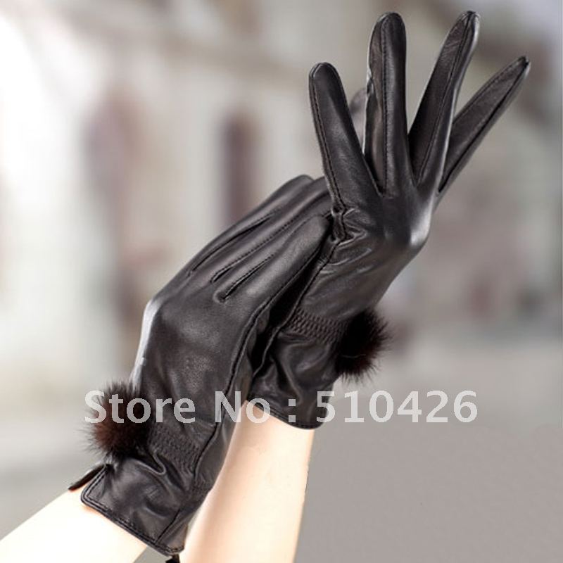 Autumn and winter women's leather gloves winter cute rabbit fur ball thermal gloves thermal leather gloves