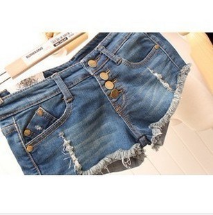 Free shipping-2012 female spring butt-lifting 4 button tassel hole denim shorts