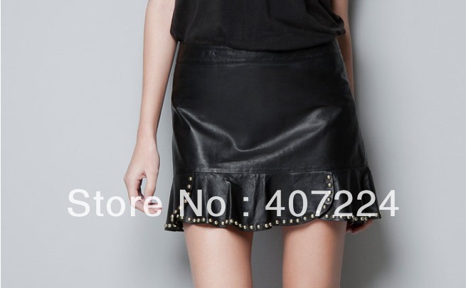 Free Shipping 2013 autumn winters of European and American wind rivet cascade leather skirt bust skirt falbala skirt