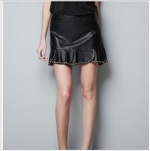 Free Shipping Fashion rivet leather skirt wave lotus leaf laciness PU bust skirt short skirt Wholesale price