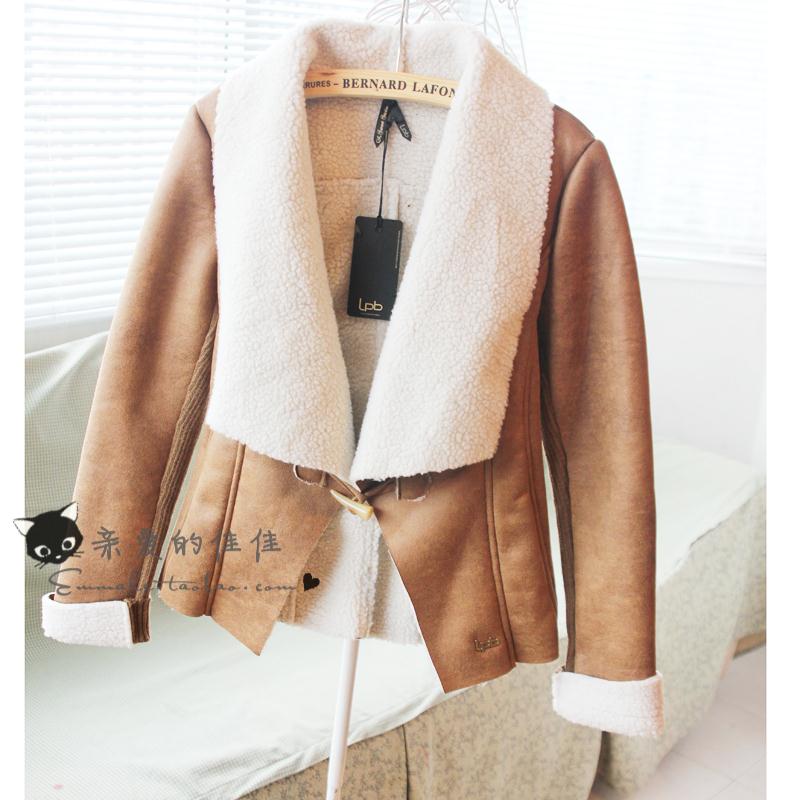 Sell like hot cakes Vintage vintage fashion suede leather chamois horn button irregular outerwear Free shipping