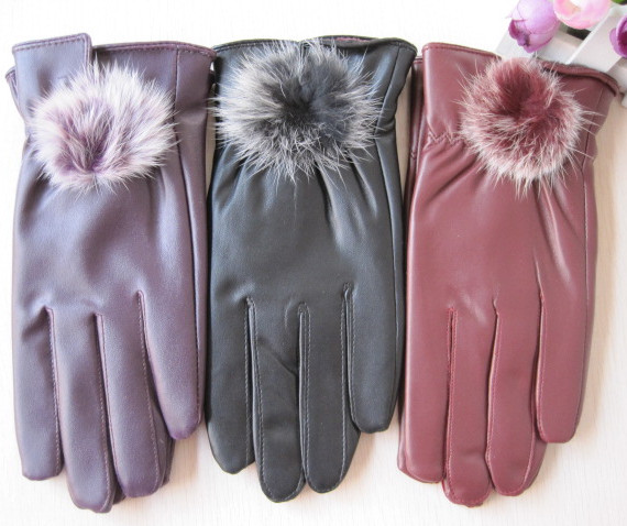 Winter windproof thermal rabbit fur ball women's leather gloves plus velvet cycling Mittens